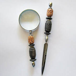  Choose an Intrepid Gold or Silver-Plated Letter Opener or Magnifying Glass $75.00 - $150.00 